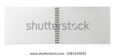Open paper notebook with coil binding. Spiral bound journal. Realistic, photography, isolated on white background. Royalty-Free Stock Photo #2381624043