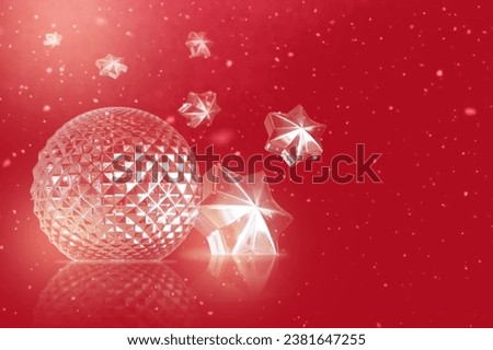 Christmas ball, flying stars and snow on red background. Christmas and new year card. Copy space