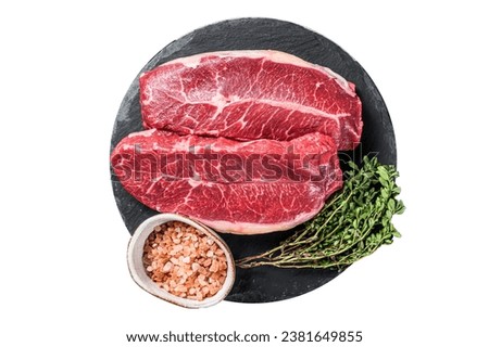 Raw top blade flat Iron beef organic meat. Isolated on white background. Royalty-Free Stock Photo #2381649855