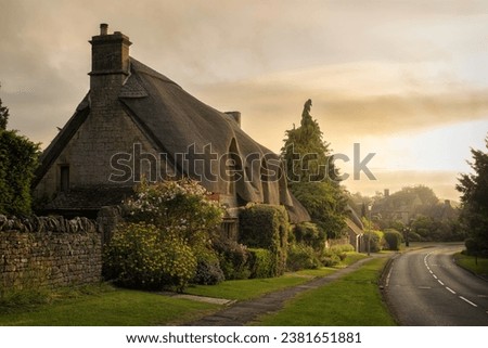 Thatched cottage at Westington, Chipping campden, Cotswolds, England Royalty-Free Stock Photo #2381651881