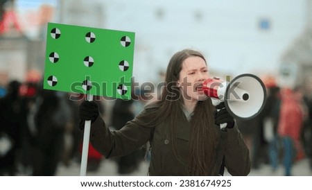 Girl with megaphone scream. Female feminist demonstration. Loudspeaker shouting. Gender rights feminism fight. Women march power sign equality. Strike empowerment action. Social message. Crowd people.