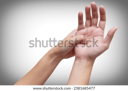 Woman suffering from palm pain, or finger pain. Hand numbness or limb numbness. Isolated on white. Pain concept.