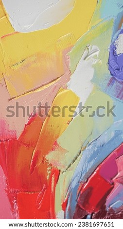 Closeup of a painting by oil and palette knife. Highly-textured, high quality details. Fragment of multicolored texture painting. Abstract art background. oil on canvas. Rough brushstrokes of paint.