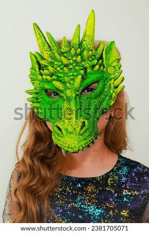Unique child. Dragon mask. Mask of green dragon. Symbol 2024 year - green dragon. Mother of the dragon