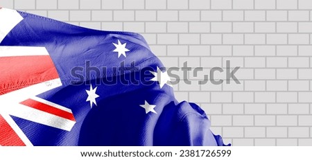 Australia national flag cloth fabric waving on beautiful bricks Background.