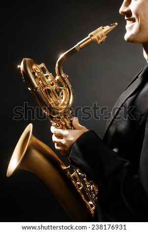 Saxophone man with music instrument Jazz saxophonist with Baritone sax