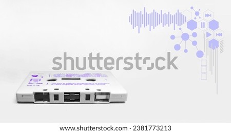 White cassette tape and white background with a play button icon and music frequency at the top