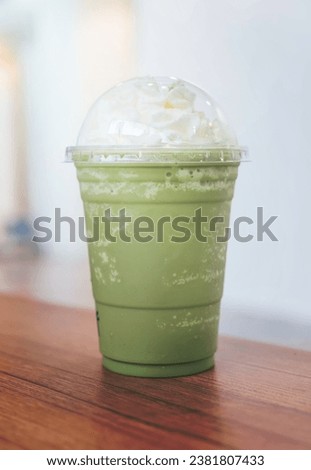 green tea latte frappe on table