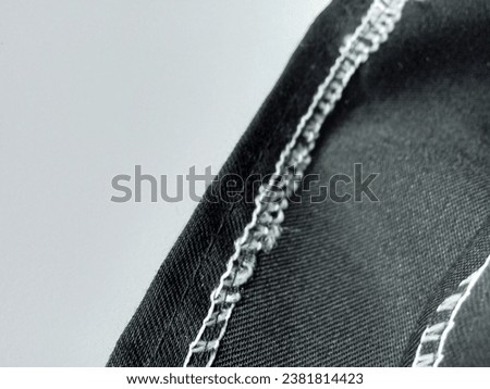 closeup of black fabric texture trousers.