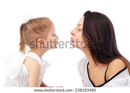 pretty young mother embracing her cute little daughter