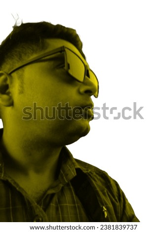Side view of a man looking forward with sunglasses uniformly white background