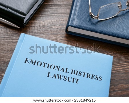 Emotional distress lawsuit and notepads. Royalty-Free Stock Photo #2381849215