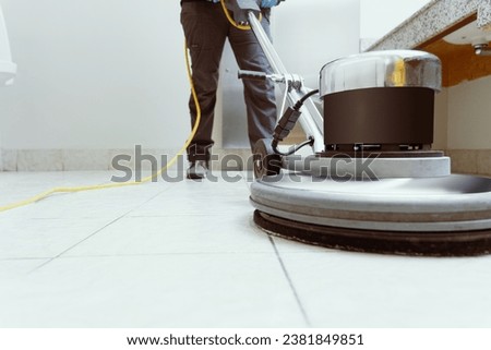 closeup of floor cleaning machine Royalty-Free Stock Photo #2381849851
