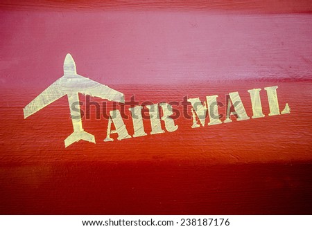 Air mail sign on wood wall background