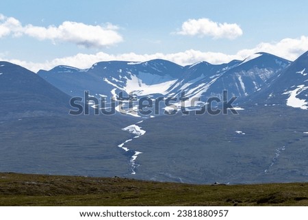 Mountains seen from Abisko national park, northern Sweden. Royalty-Free Stock Photo #2381880957
