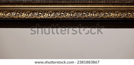 Fragment of a baguette frame made of metal and plastic background texture close up
