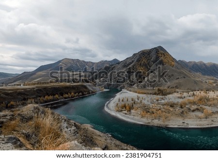 Монголия Calm river in rough mountainous terrain  Drone Photo