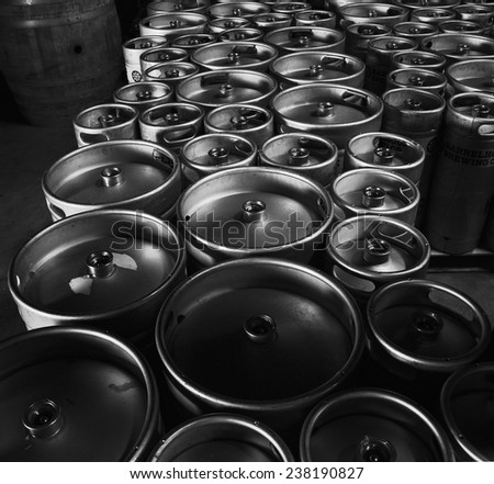 Kegs upon kegs at a brewery  Royalty-Free Stock Photo #238190827