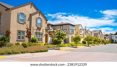Row of townhomes on a Sunny day in California Royalty-Free Stock Photo #2381912339