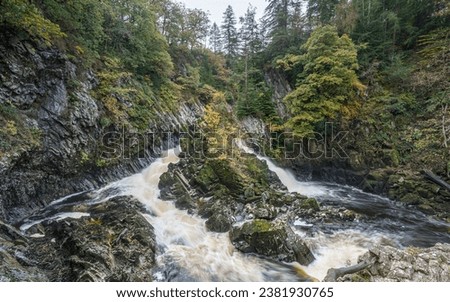 Conwy Falls near Betws-y-Coed, pictured in autumn as the River Conwy cascades over rocks.
