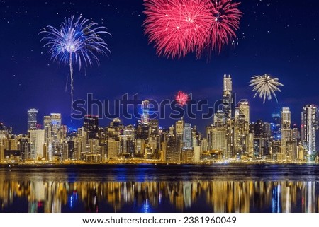 fire work above city skyline water Royalty-Free Stock Photo #2381960049