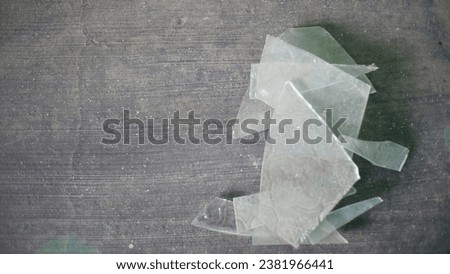 fragments of broken glass on the floor