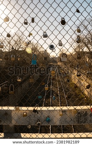 Locks on a bridge are a symbol of love for the couples