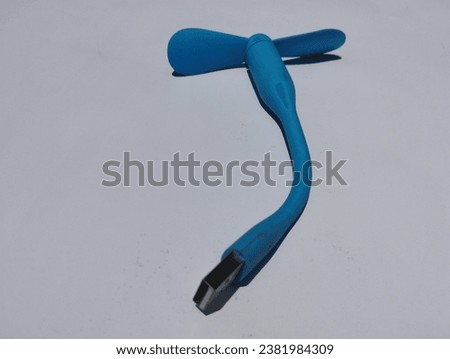 small blue powered fan in asia