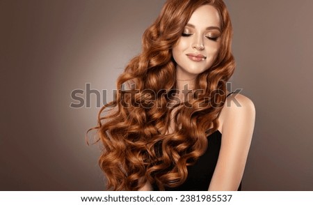 Beautiful laughing Redhead model  girl , with long curly red hair . Smiling  woman hairstyle  curls wavy . Fashion , beauty and makeup portrait
 Royalty-Free Stock Photo #2381985537