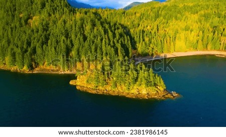 Mountain Serenity: Aerial Sunrise Over a Beautiful Deep Mountain Lake, lake in the mountains.