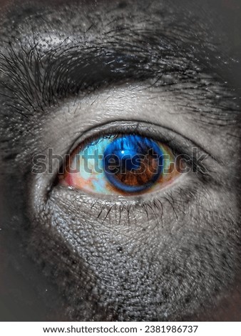 selective focus on human eyes red blue color with blurred face.it is edited picture