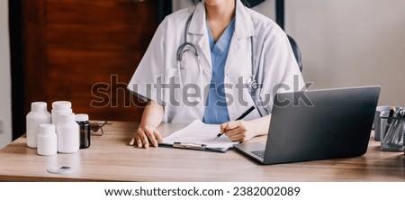 Medical technology concept. Doctor working with mobile phone and stethoscope in modern office