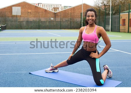 young woman stretching