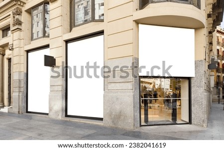 Fashion clothing storefront facade and blank windows for your own branding