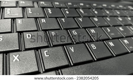 Black laptop keyboard as a tool for typing and doing a lot of work