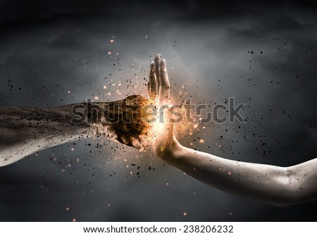 One hand preventing punch attack of another hand Royalty-Free Stock Photo #238206232