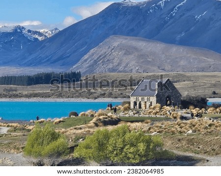 It is a picture of the beautiful Lake Tekapo's church, night view, and clear scenery. You can see the wide lake and beautiful sunshine.