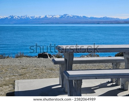 It is a picture of the beautiful Lake Tekapo's church, night view, and clear scenery. You can see the wide lake and beautiful sunshine.