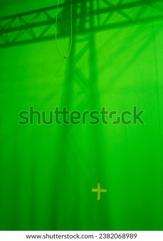 Green croma key screen in television, movie film and photography studio for shoots and photography