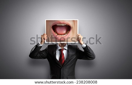 Unrecognizable businessman holding photo with screaming mouth Royalty-Free Stock Photo #238208008
