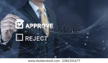 Businessman writing or tick correct mark to approve. check electronic documents on digital documents and checklist approval, online evaluation of business on virtual interface Royalty-Free Stock Photo #2382101677