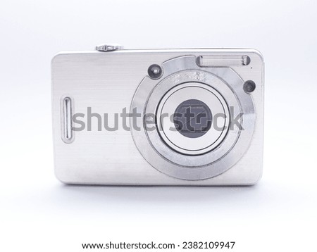 silver digital pocket camera isolated on white background