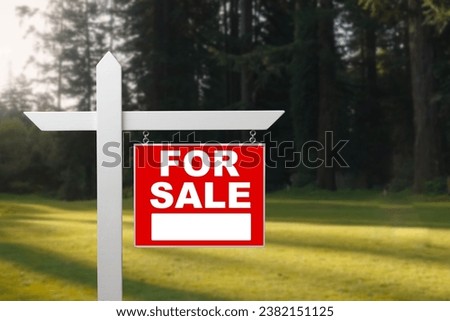Conceptual sign against beautiful landscape with text - FOR SALE