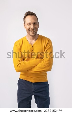Closeup photo of crazy funky energetic guy open mouth best excited feelings emotions listen good news wear casual yellow t-shirt on white background