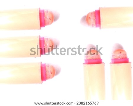 Photo of a make-up tool which is lipstick or artificial color for women's lips 