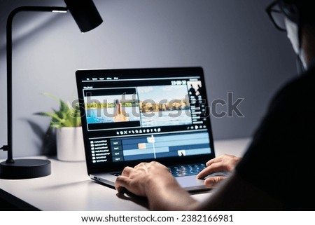 Video edit and film making with editor. Content production. Man editing movie with computer software. Videographer, director or filmmaker working with laptop. Digital montage maker. Special effects.