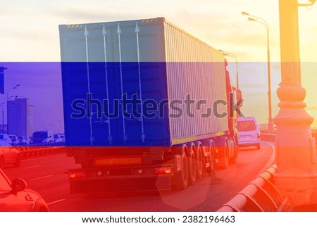 truck with sea container and flag of Russia on background, cargo concept from of Russia