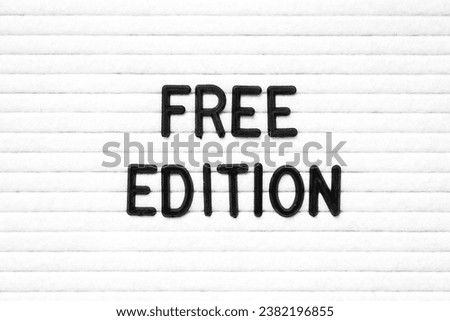 Black color letter in word free edition on white felt board background