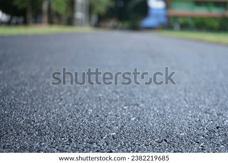 Asphalt road surface, construction completed Royalty-Free Stock Photo #2382219685