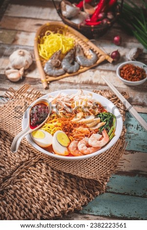 Spicy Prawn Noodle. A delicacy made popular by the Chinese in Malaysia. Penang Hokkien Mee. Penang Prawn Mee. Royalty-Free Stock Photo #2382223561